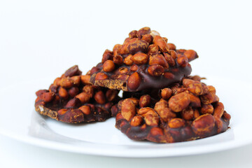 Gula kacang, is a traditional snack from Indonesia, made from roasted peanuts and brown sugar. Also called as Ampyang