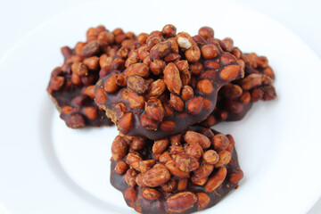 Gula kacang, is a traditional snack from Indonesia, made from roasted peanuts and brown sugar. Also called as Ampyang