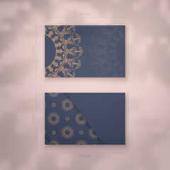Blue color business card template with vintage brown pattern for your brand.