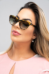 sunglasses, woman, fashion, glasses, beauty, face, model, hair, people, lady, person, glamour, summer, lips, teen, one, smile, brunette, studio, style, eyes, stylish, black, elegance, looking