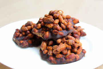 Gula kacang, is a traditional snack from Indonesia, made from roasted peanuts and brown sugar. Also called as Ampyang