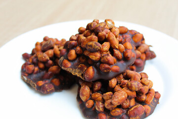 Gula kacang, is a traditional snack from Indonesia, made from roasted peanuts and brown sugar. Also called as Ampyang