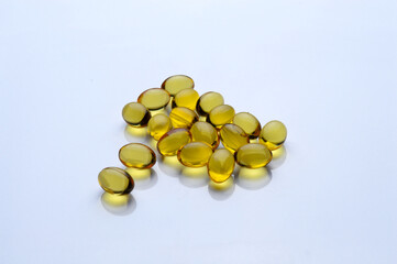 Omega 3 Fish Oil Supplement Capsules on a White Background.