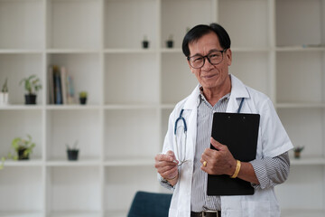 Portrait asian male senior doctor hospital medical clinic medicine health care.