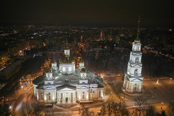 Scenic aerial view of ancient orthodox Spassky cathedral in center of old historic touristic city Penza in Russian Federation. Beautiful winter look of old orthodox church in nighttime illumination