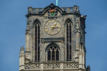 Detail of the church tower of the Grote- or Sint Laurenskerk with the coat of arms of Rotterdam,...