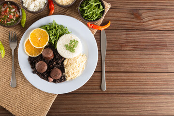 Feijoada typical Brazilian food. Traditional Brazilian food made with black beans. Top view. copy space