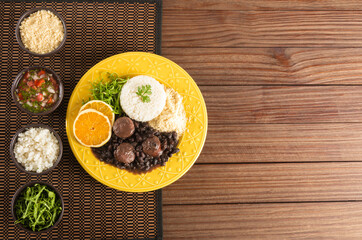 Feijoada typical Brazilian food. Traditional Brazilian food made with black beans. Top view. copy space