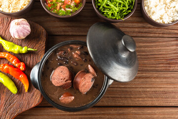 Feijoada typical Brazilian food. Traditional Brazilian food made with black beans. Top view. copy space
