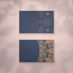 Business card in blue with brown mandala ornament for your personality.