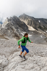 Women trail running in the European alps of Austria