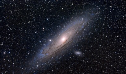 Obraz na płótnie Canvas Галактика Андромеды Галактика Андромеды или M31, расположенная в одноименном созвездии. Это самая яркая галактика, которую можно увидеть невооруженным глазом. В будущем, а именно через 3 млрд лет, о