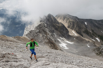 Naklejka premium Women trail running in the European alps of Austria