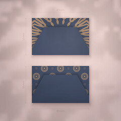 Business card in blue with Greek brown ornaments for your personality.