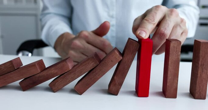 Businesswoman stops serving wooden blocks on red slow motion 4k movie