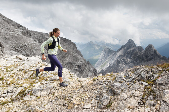 Women trail running in the European alps of Austria