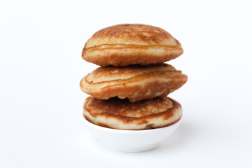 Kue Samir or Kamir or Khamir, traditional pancake from Pemalang, Indonesia. Isolated on whte background. Side view.