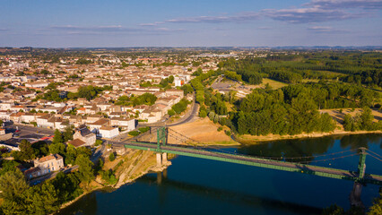 View from drone of summer Marmande cityscape with Notre-Dame de Marmande, France