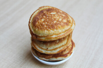 Kue Samir or Kamir or Khamir, traditional pancake from Pemalang, Indonesia. Wooden background.
