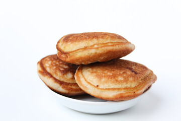 Obraz na płótnie Canvas Kue Samir or Kamir or Khamir, traditional pancake from Pemalang, Indonesia. Isolated on whte background. Side view.