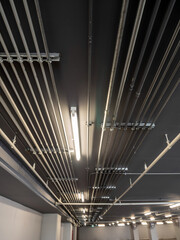 Installation of Electrical metallic conduits on the ceiling