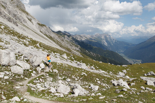 Women trail running in the European alps of Austria