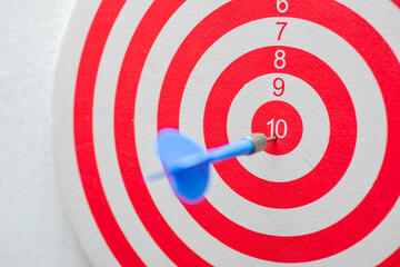 dartboard with arrow. creative concept idea for success with focus point on target to the winner in...