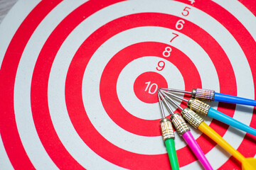 dartboard with arrow. creative concept idea for success with focus point on target to the winner in business with strategy management aim to leadership.