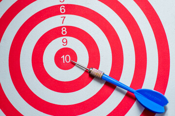 dartboard with arrow. creative concept idea for success with focus point on target to the winner in...