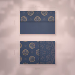 Business card in blue with vintage brown ornaments for your personality.