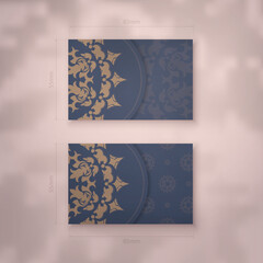 Business card template in blue with a luxurious brown pattern for your personality.