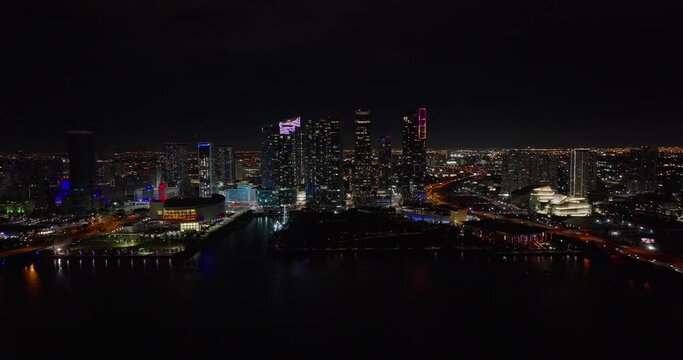 Night aerial approach Downtown Miami 5k city neon lights