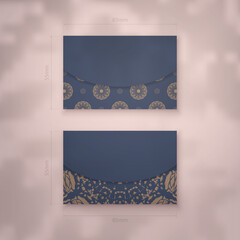 Business card template in blue with abstract brown ornament for your business.
