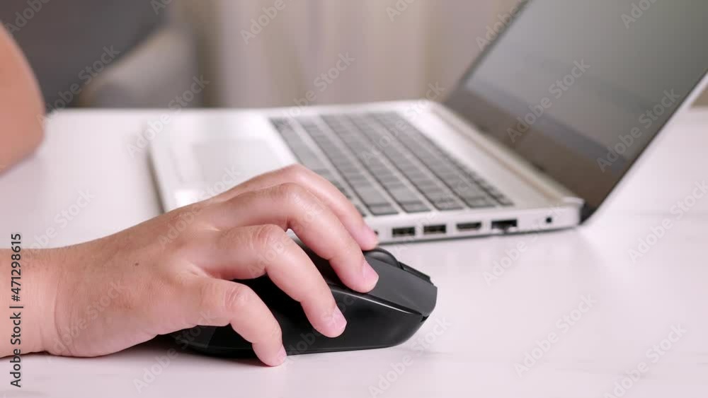 Aufkleber close up of woman use of computer with mouse. businesswoman hand using mouse working on notebook