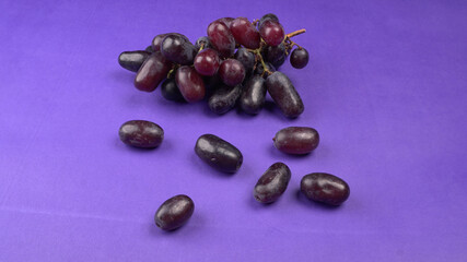 Natural organic different types of fresh ripe juicy grapes and space for text on table. top view, Agriculture concepts.