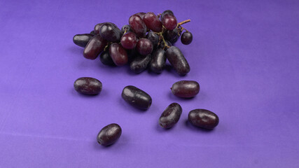 Natural organic different types of fresh ripe juicy grapes and space for text on table. top view, Agriculture concepts.