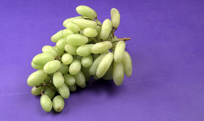 Natural organic different types of fresh ripe juicy grapes and space for text on table. top view, Agriculture concepts.