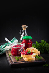Vegetarian food. Jar with beetroot pate. Healthy eating. Sandwiches with beetroot and walnut pate.