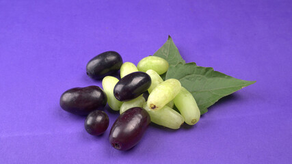 Natural organic different types of fresh ripe juicy grapes and space for text on table. top view, Agriculture concepts.