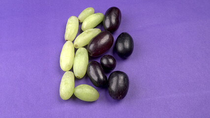 Natural organic different types of fresh ripe juicy grapes and space for text on table. top view, Agriculture concepts.