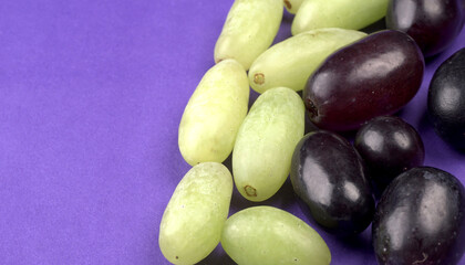 Natural organic different types of fresh ripe juicy grapes and space for text on table. top view, Agriculture concepts.