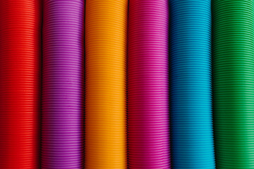 Colorful anti-stress fidget pop tube sensory toy. Flat lay.
