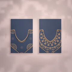 Business card template in blue with Indian brown ornaments for your contacts.