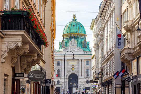 Vienna, Austria - October 2021: Kohlmarkt shopping street with Hofburg palace at background