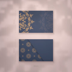 Business card template in blue with luxurious brown ornaments for your contacts.