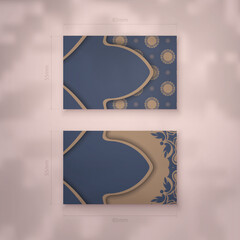 Business card template in blue with luxurious brown ornaments for your personality.