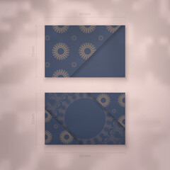 Business card template in blue with vintage brown ornament for your business.
