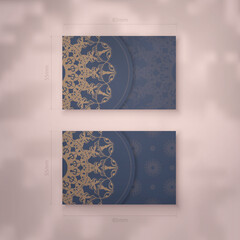 Business card template in blue with vintage brown ornament for your business.