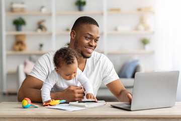 Black Man Study With Laptop At Home And Taking Care About Baby