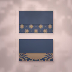 Business card template in blue with vintage brown ornament for your contacts.